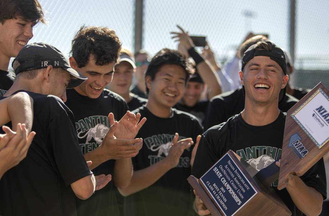 Palo Verde captain Jack Kostrinsky accepts the 4A varsity boys state championship trophy as his ...