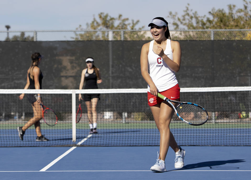 Coronado's Sidra Wohlwend cheers as she and her partner Kaylen Heiss beat Palo Verde 7-5 during ...