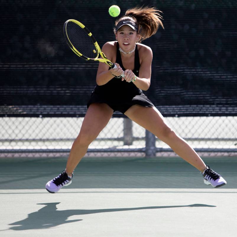 Palo Verde's Roxy Okano eyes to hit the ball during a doubles match against Coronado's Sofia Po ...