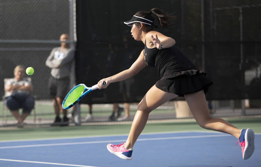 Palo Verde's Caroline Hsu reaches to hit the ball during a doubles match against Coronado on We ...