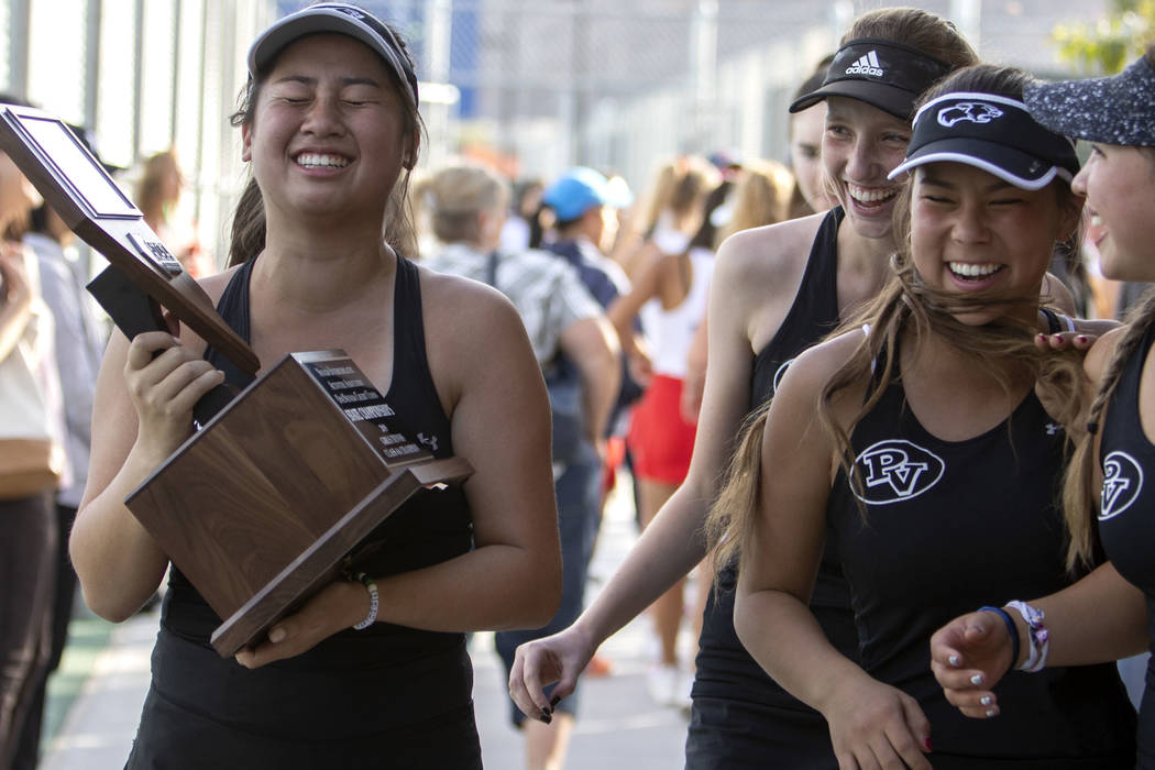 Palo Verde girls varsity tennis captain Caroline Hsu, left, cries after accepting the class 4A ...