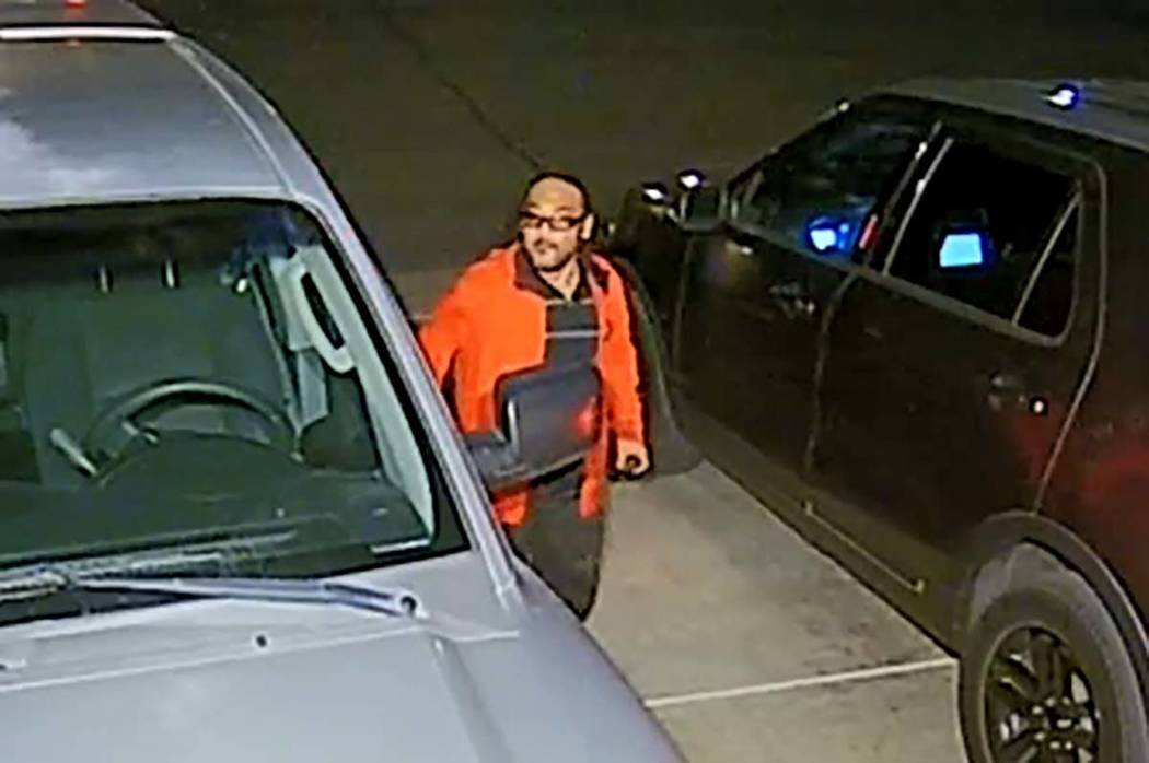 A video camera caught a man casing cars at an unknown Henderson neighborhood overnight on Thurs ...