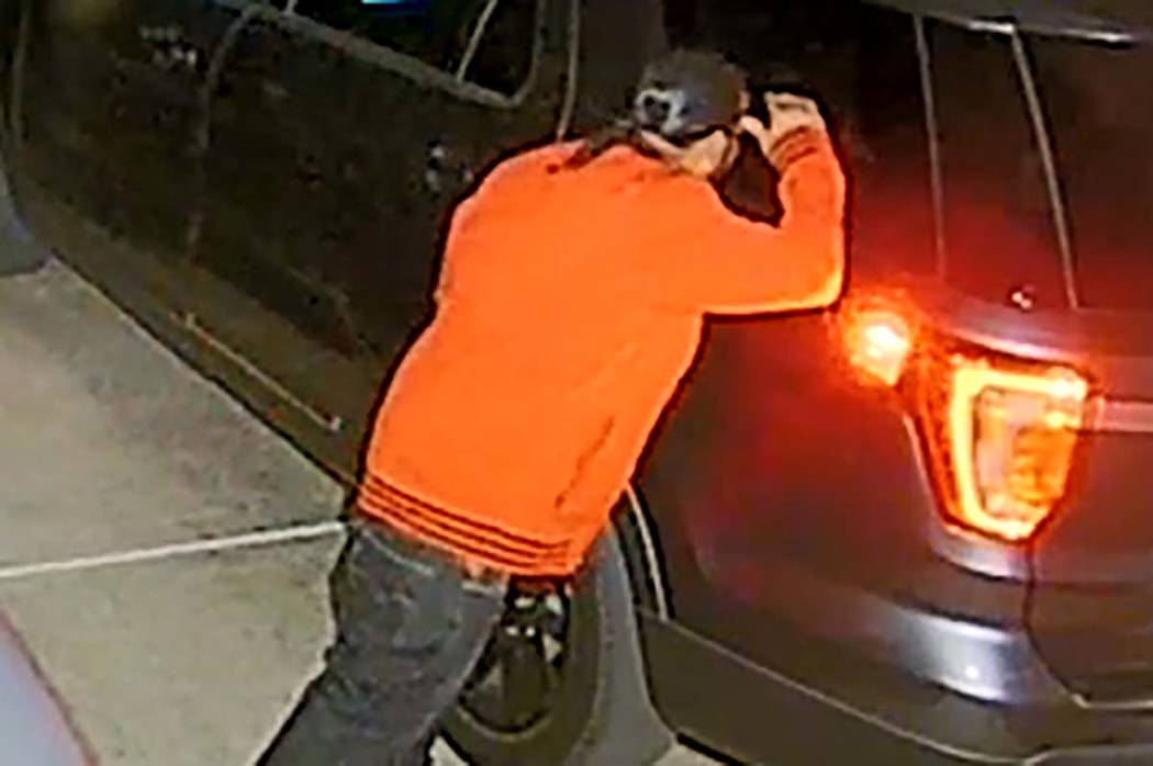 A video camera caught a man casing cars at an unknown Henderson neighborhood overnight on Thurs ...