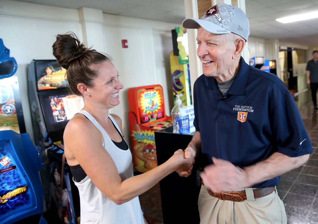 Houston furniture store owner Jim "Mattress Mack" McIngvale, 68, greets customer Holl ...