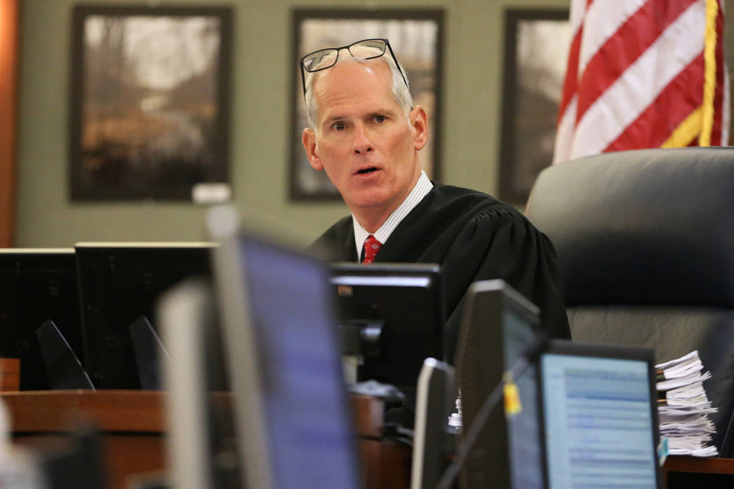 District Judge Douglas Herndon listens during a hearing for Giovanni Ruiz, accused of raping an ...