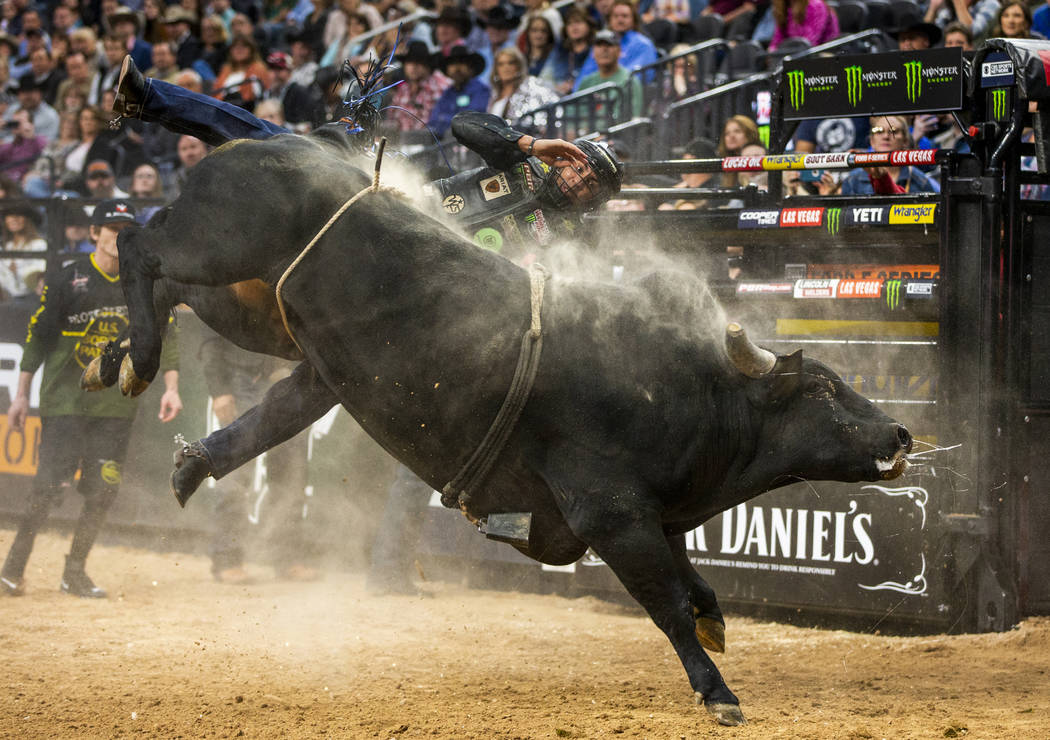 Luciano De Castro gets bucked off the side of Gangster Party during the PBR World Finals at T-M ...