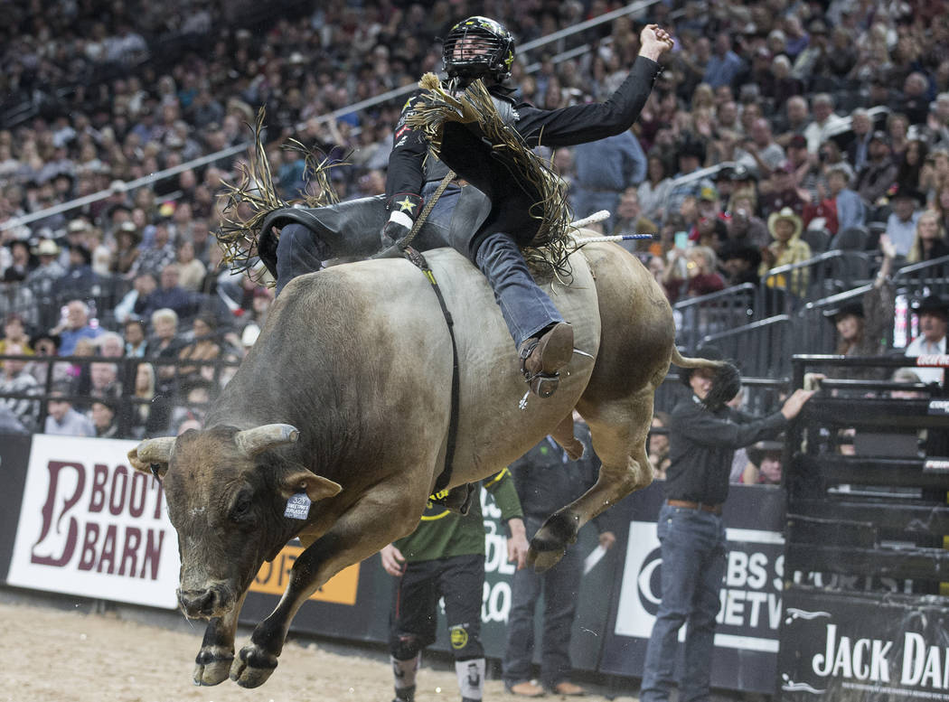 Cody Teel rides SweetPro's Bruiser during day two of the PBR World Finals on Thursday, Nov. 7, ...
