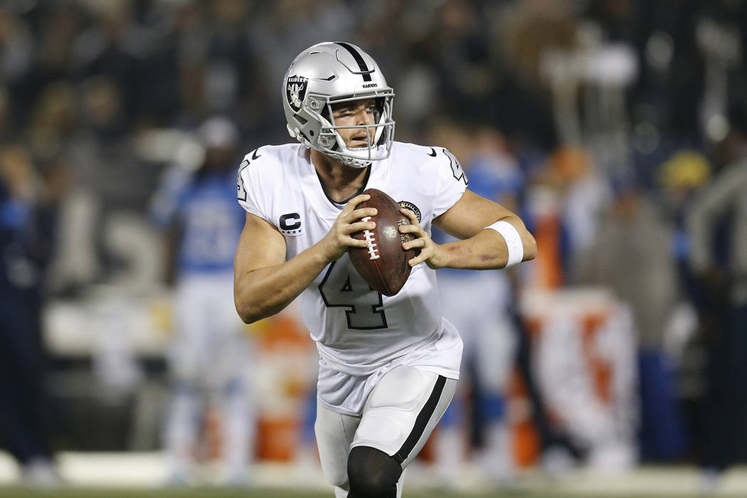 Oakland Raiders quarterback Derek Carr (4) against the Los Angeles Chargers during the second h ...