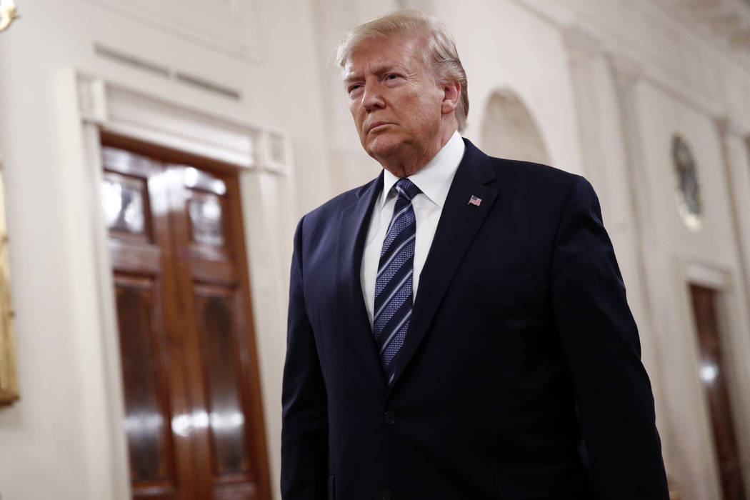 President Donald Trump arrives to speak at a ceremony to present the Presidential Citizens Meda ...