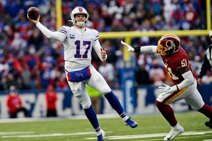 Buffalo Bills quarterback Josh Allen (17) passes against the Washington Redskins during the sec ...