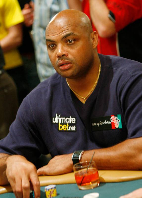 Charles Barkley plays in the Ante Up For Africa charity poker tournament during the World Serie ...