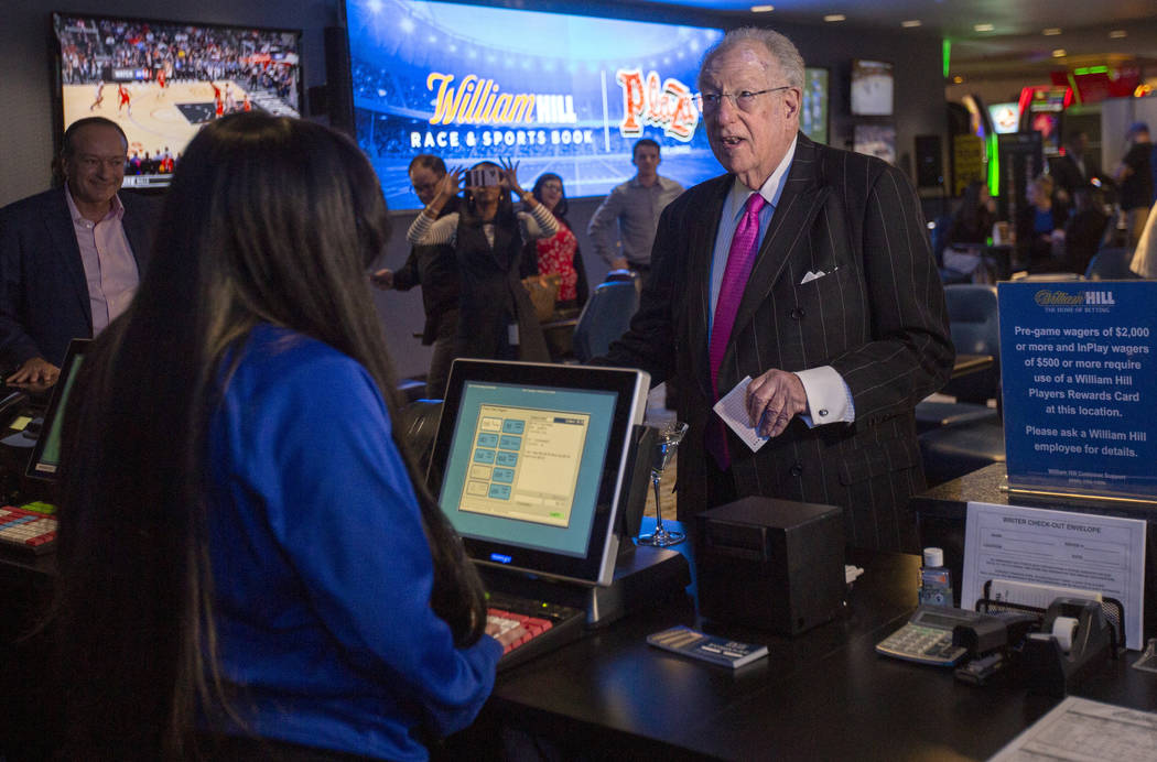 Former Las Vegas Mayor Oscar Goodman places the first bet at the William Hill Race & Sports ...