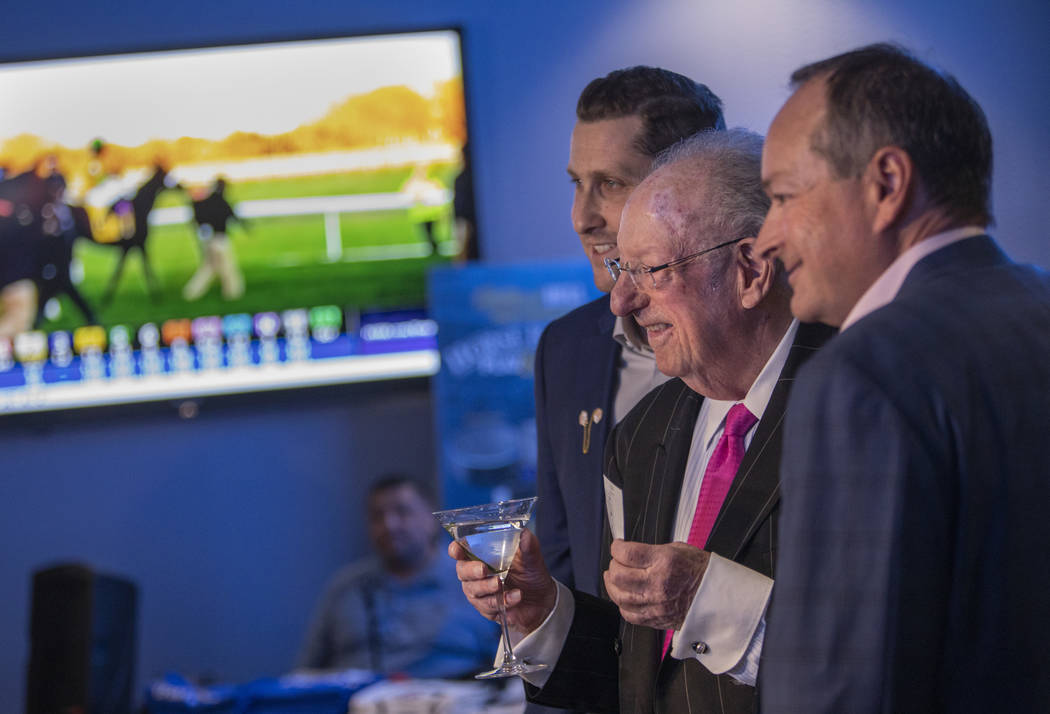 Plaza CEO Jonathan Jossel, left, former Las Vegas Mayor Oscar Goodman, center, and William Hill ...