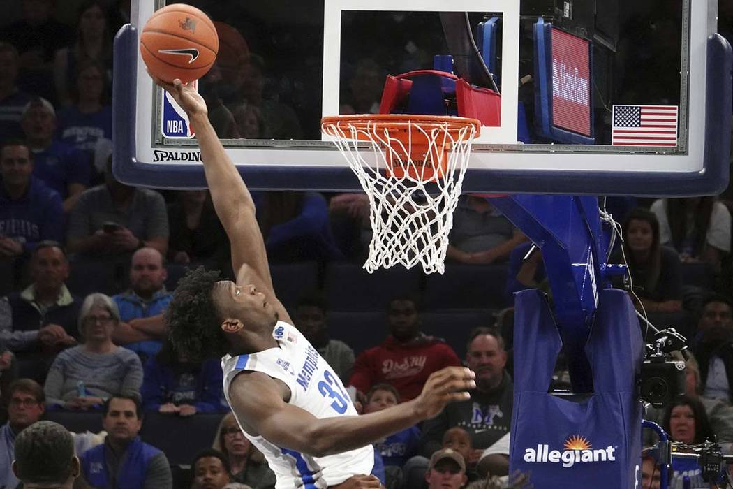 Memphis' James Wiseman (32) dunks against South Carolina State during the first half of an NCAA ...