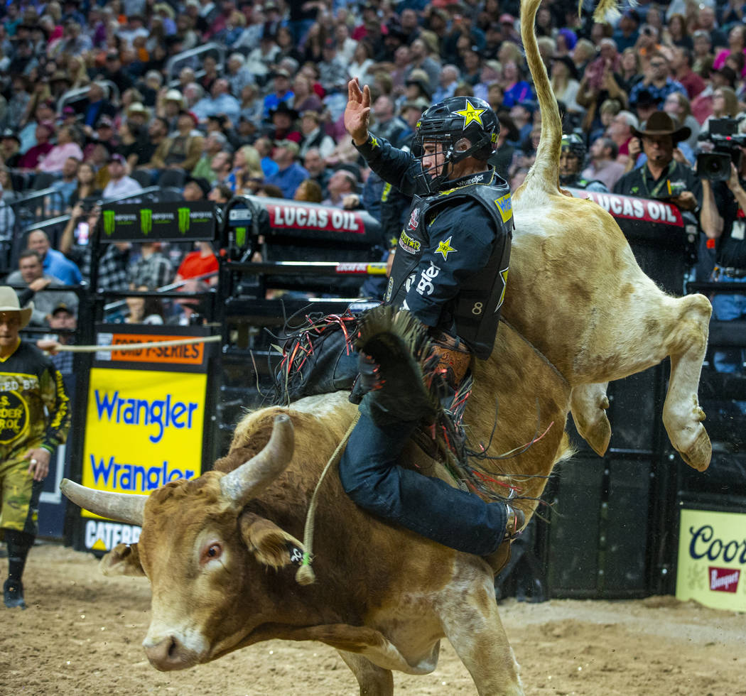 Ramon de Lima leans back on Switchback during the third day of the PBR World Finals at T-Mobile ...