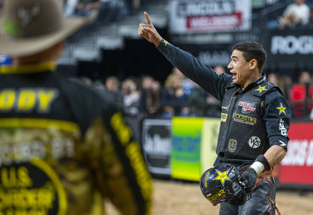 Ramon de Lima is pleased with his ride on Switchback during the third day of the PBR World Fina ...
