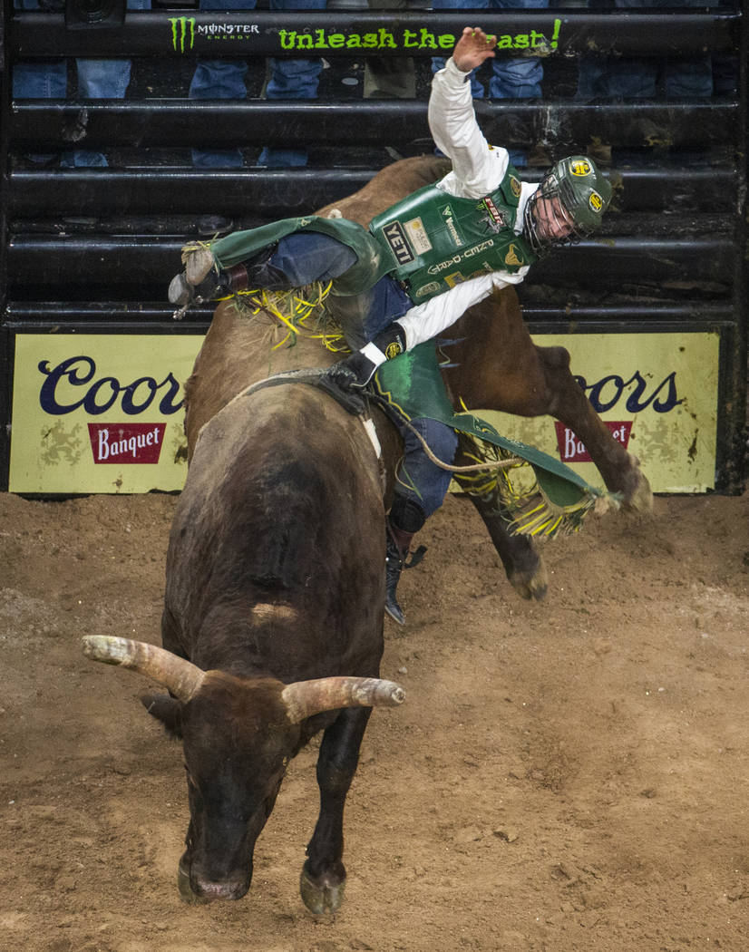 Jess Lockwood makes another winning ride atop of Biker Bob during the third day of the PBR Worl ...