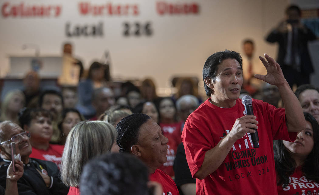 Members of the crowd at a UNITE HERE town hall ask presidential candidate Kamala Harris questio ...