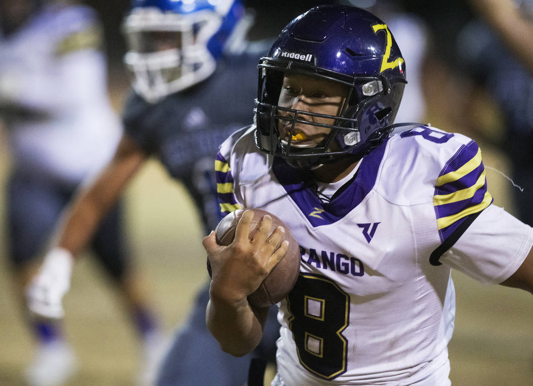 Durango's Ryan Cabase (8) streaks down the sideline for a big run in the first quarter during t ...