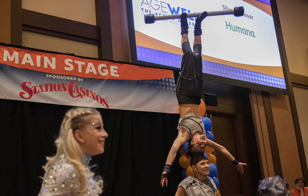 Performers from the show Celestia entertain the crowd at the AgeWell Expo on Saturday, Nov. 9, ...