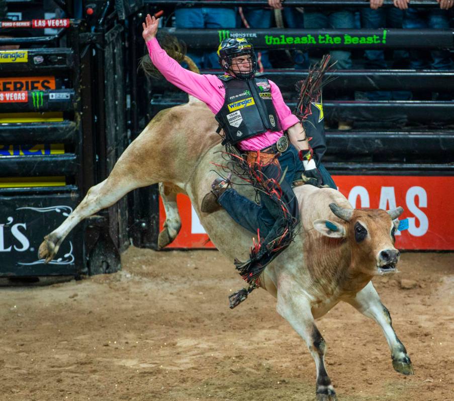 Ramon de Lima leans back on Ridin Solo during the third day of the PBR World Finals at T-Mobile ...