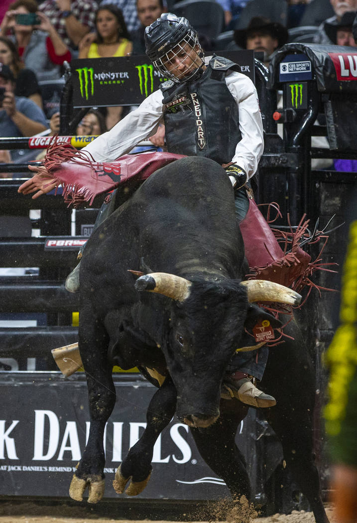 Dalton Kasel stays balanced atop of Secret Sauce during the fourth day of the PBR World Finals ...