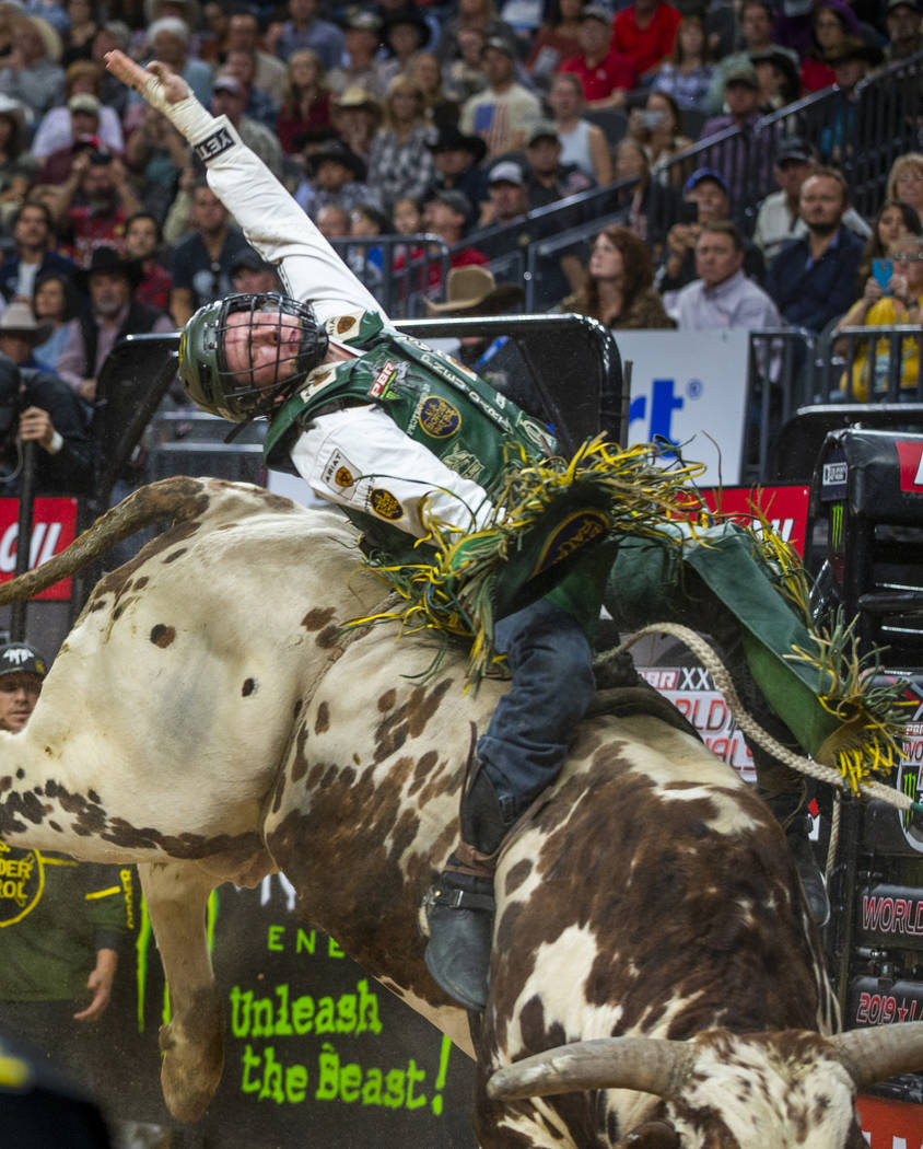Cooper Davis leans way back on M.A.G.A. during the fourth day of the PBR World Finals at T-Mobi ...