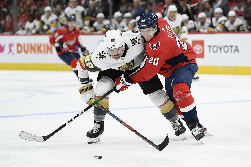 Washington Capitals center Lars Eller (20), of Denmark, and Vegas Golden Knights left wing Will ...