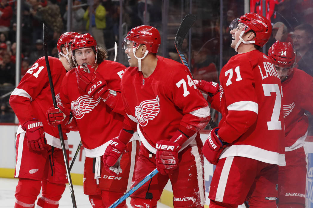 Detroit Red Wings defenseman Madison Bowey (74) is congratulated after scoring during the third ...