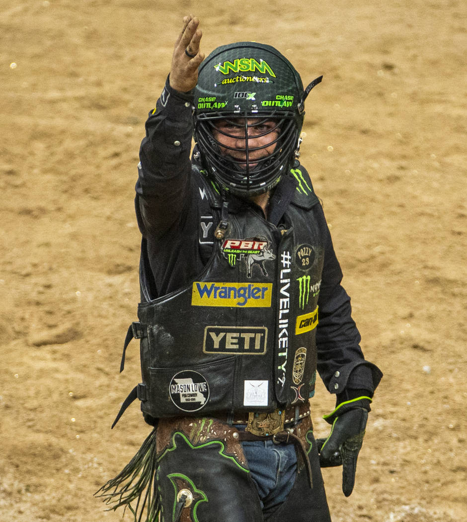 Chase Outlaw is pumped after a successful ride atop of Big Black during the last day of the PBR ...