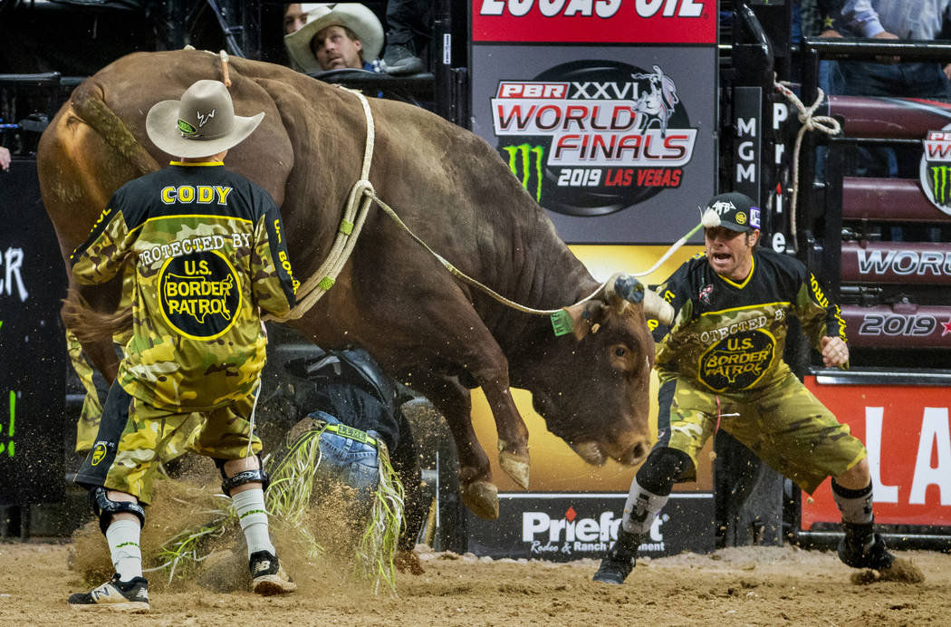 Jose Vitor Leme is pounded on beneath of Lil 2 Train during the last day of the PBR World Final ...