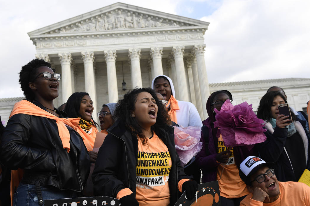 People protest outside the Supreme Court in Washington, Friday, Nov. 8, 2019. The Supreme Court ...