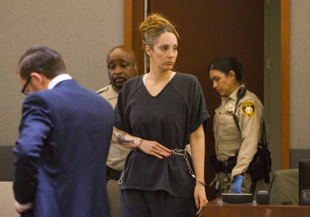 Attorney Alexis Plunkett enters the courtroom at the Regional Justice Center in Las Vegas on Tu ...