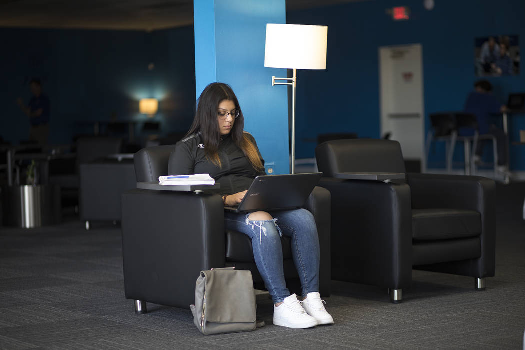 Deserey Luna, 16, writes an essay at Acceleration Academy in Las Vegas, Sunday, Nov. 10, 2019. ...