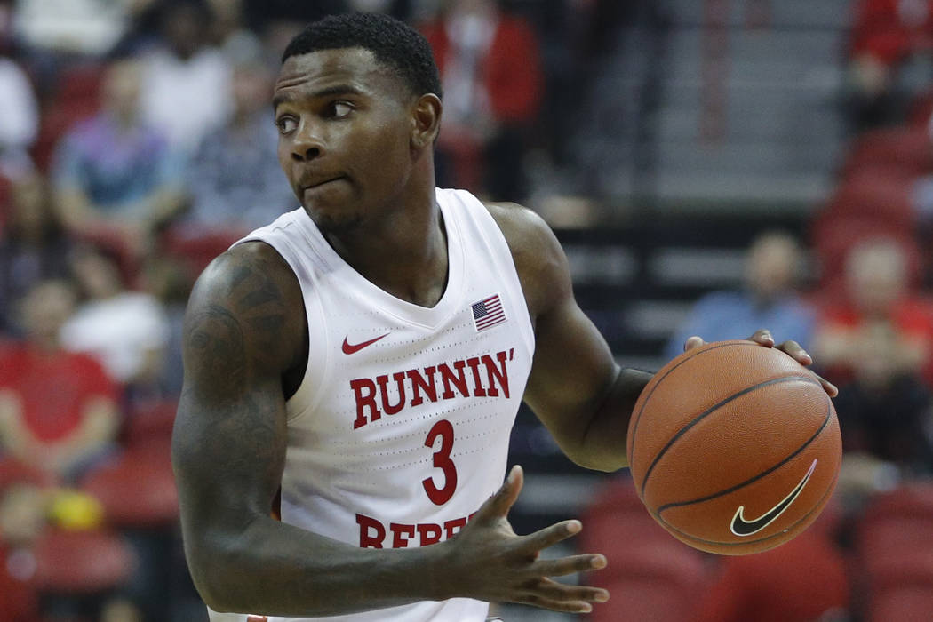 UNLV's Amauri Hardy (3) plays against Kansas State in an NCAA college basketball game Saturday, ...