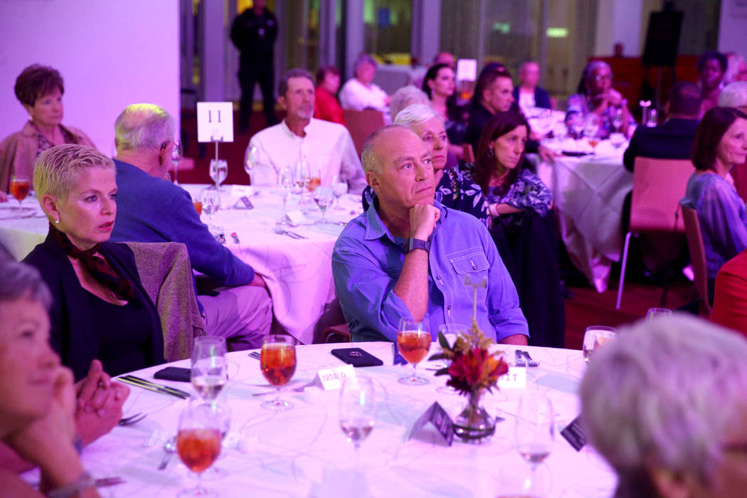 Guests, including Nora Kraidman and her husband Amit Kraidman, of Las Vegas, listen during Deat ...