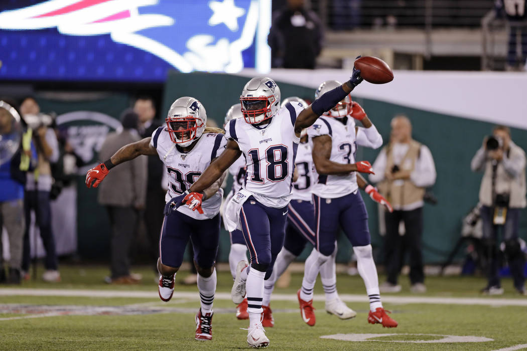 New England Patriots' Matthew Slater (18) celebrates with teammates during the second half of a ...