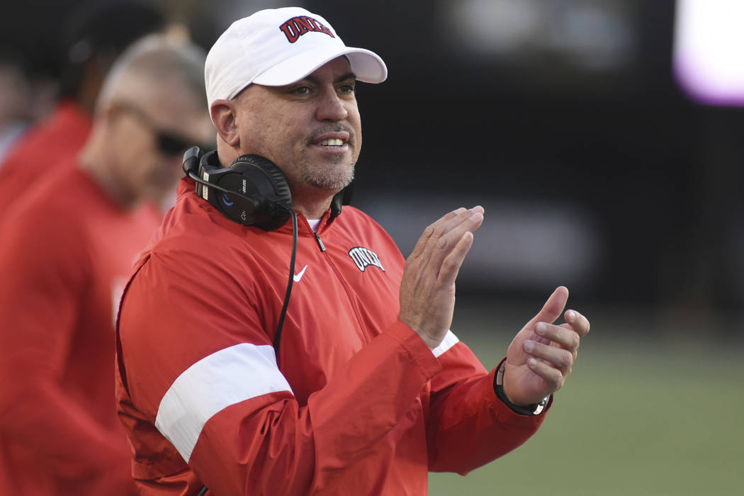 UNLV Head Coach Tony Sanchez encourages his team against Vanderbilt in the second half of an NC ...