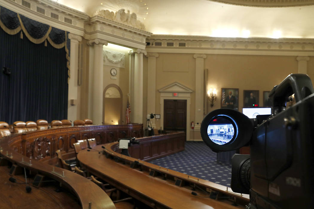 A television camera shows the hearing room where the House will begin public impeachment inquir ...