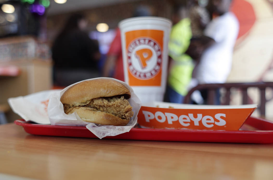 FILE - This Aug. 22, 2019, file photo shows a chicken sandwich at a Popeyes restaurant in Kyle, ...