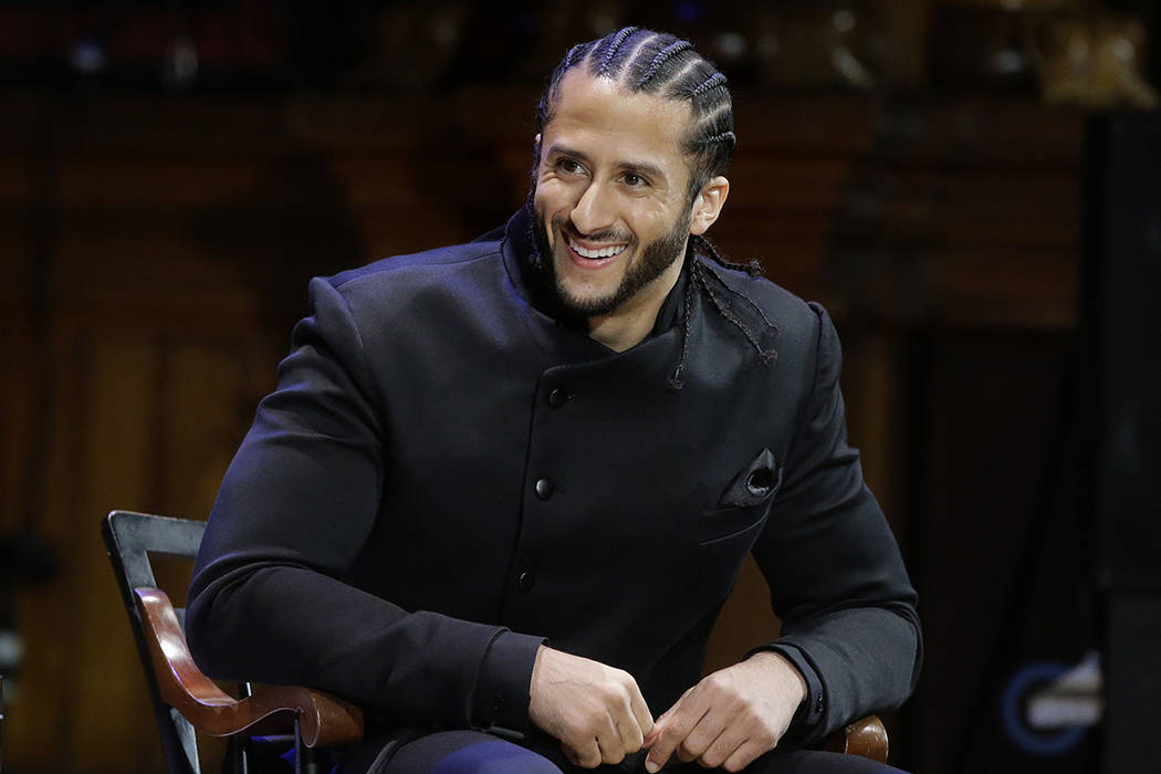 FILE - In this Oct. 11, 2018, file photo, former NFL football quarterback Colin Kaepernick smil ...