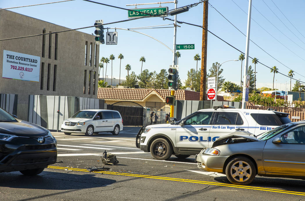 North Las Vegas police investigate an accident near the recently installed gate at Foremaster L ...