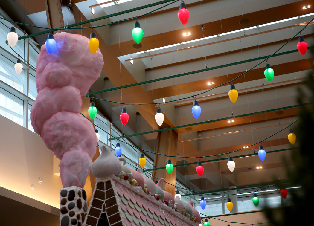 A 15-foot-tall gingerbread house in the lobby of Aria in Las Vegas Monday, Nov. 18, 2019. The t ...