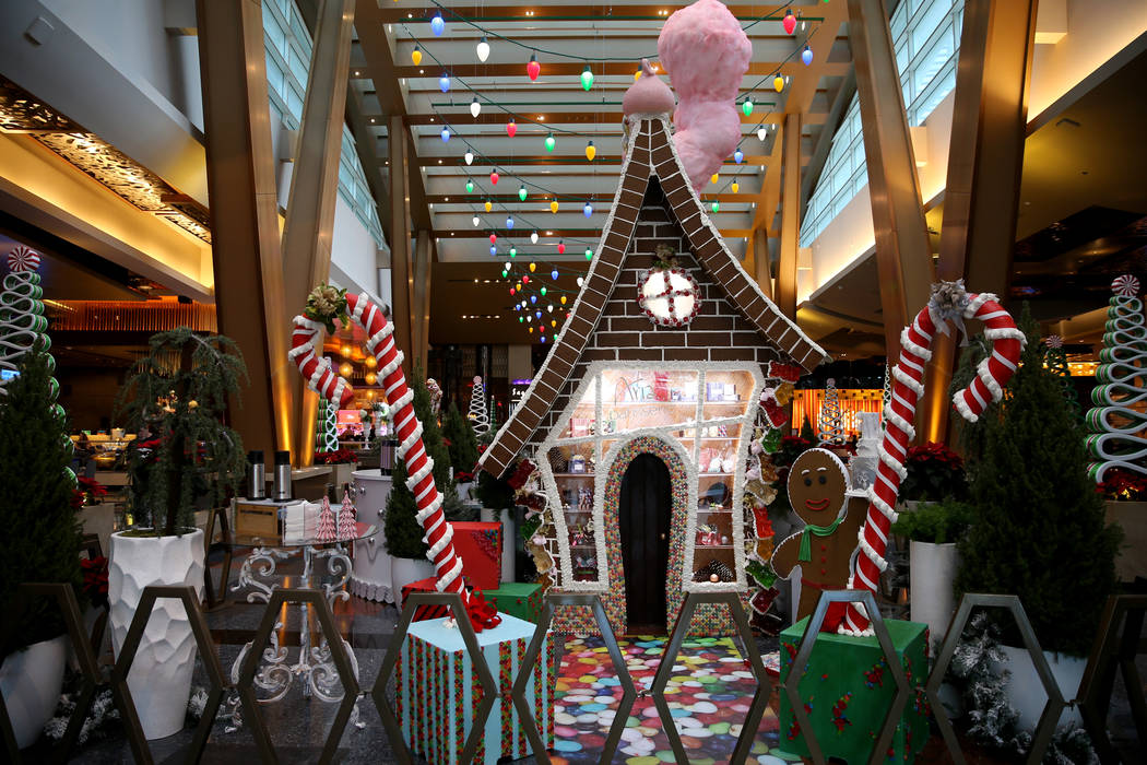 A 15-foot-tall gingerbread house in the lobby of Aria in Las Vegas Monday, Nov. 18, 2019. The t ...