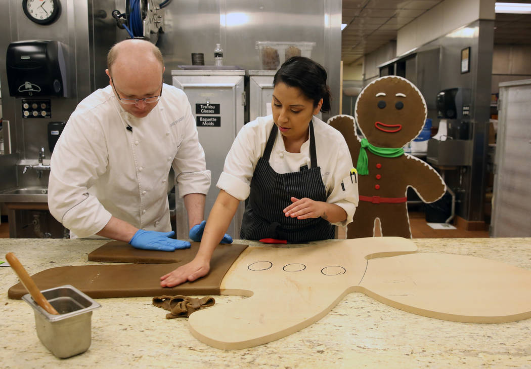 Jake Broadbent, left, assistant executive pastry chef at ARIA resort-casino, left, and Andrea M ...