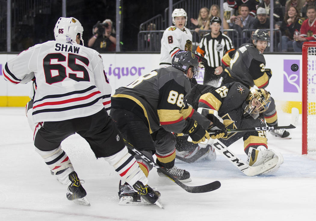 Vegas Golden Knights goaltender Marc-Andre Fleury (29) makes a diving save against Chicago Blac ...