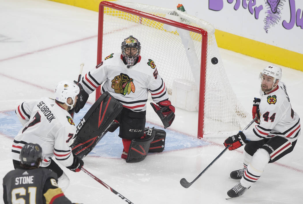Vegas Golden Knights right wing Mark Stone (61) watches his shot on Chicago Blackhawks goaltend ...