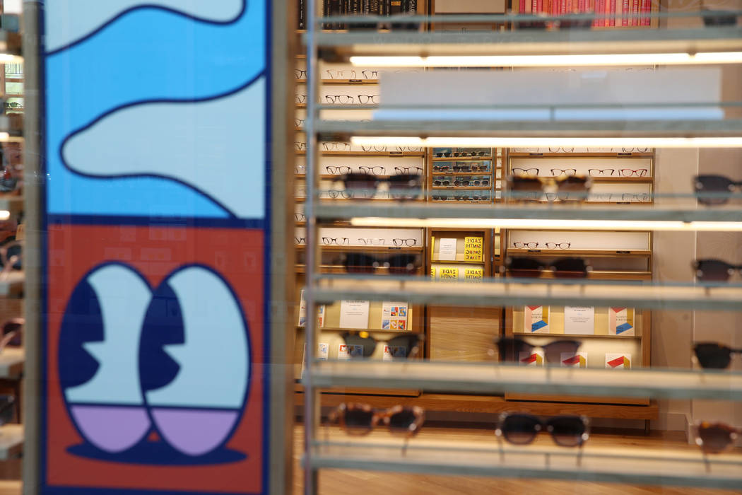 Glasses on display at the new Warby Parker store in Downtown Summerlin in Las Vegas, Thursday, ...