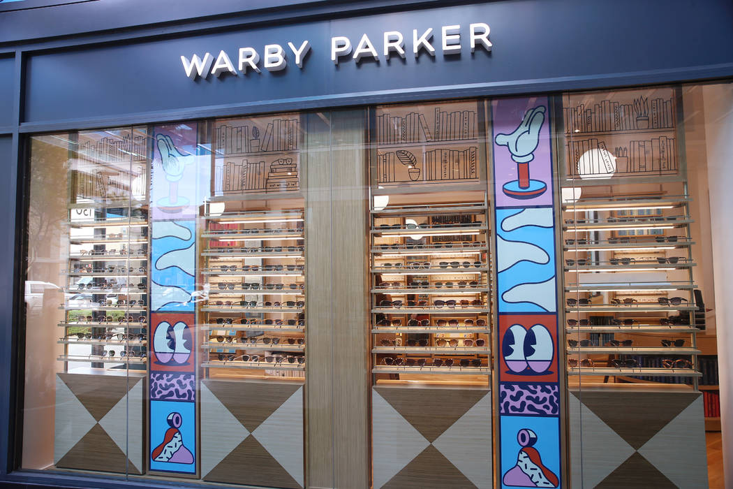 Glasses on display at the new Warby Parker store in Downtown Summerlin in Las Vegas, Thursday, ...