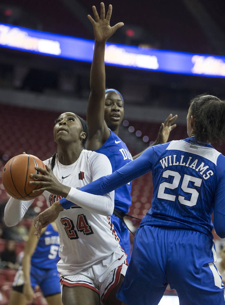 UNLV Lady Rebels guard Rodjanae Wade (24) slices past Duke Blue Devils forward Jade Williams ( ...